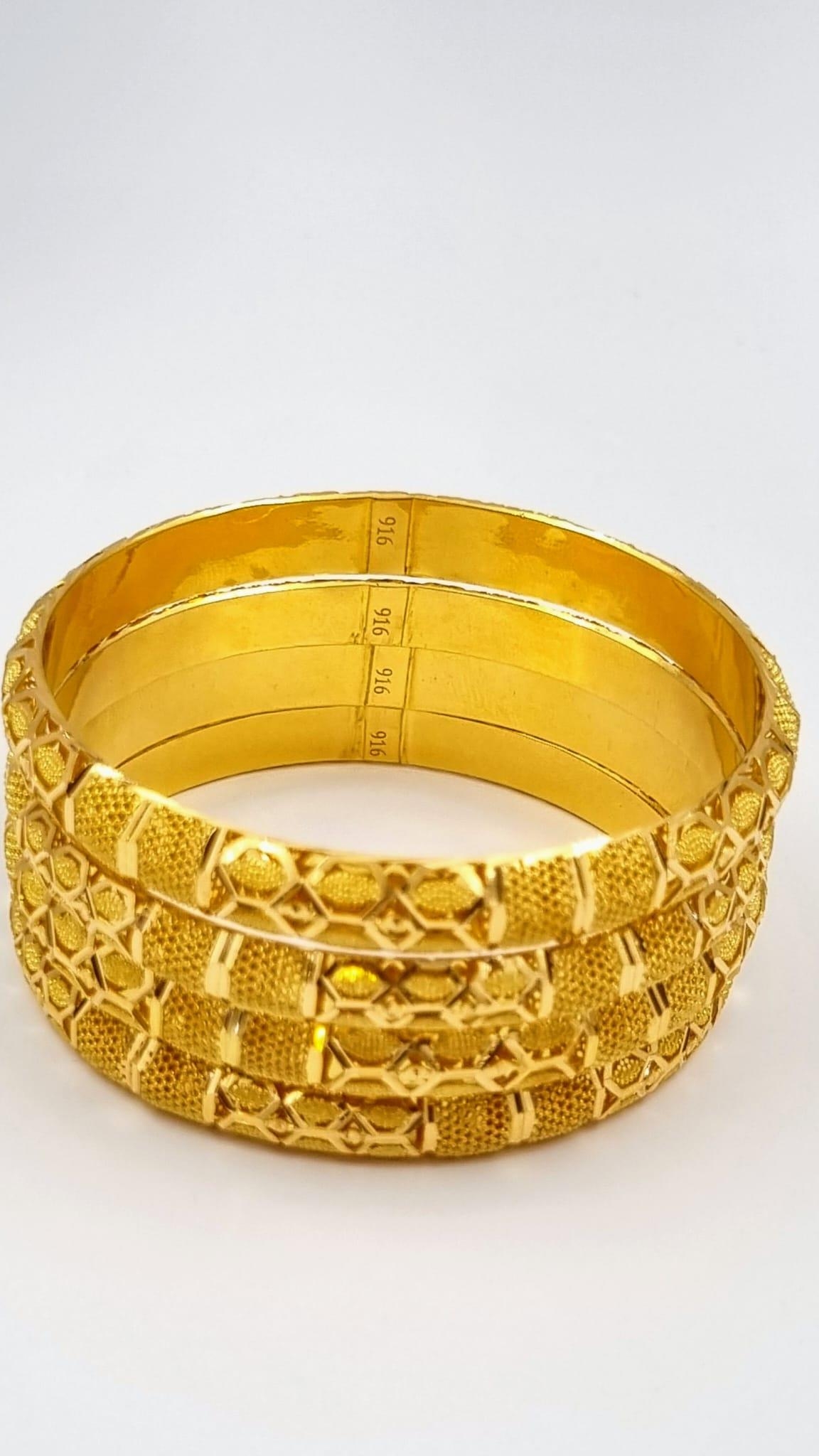 Four 22k Yellow Gold Asian Wedding Bangles. Geometric pierced decoration throughout. 6.5cm inner - Image 4 of 4