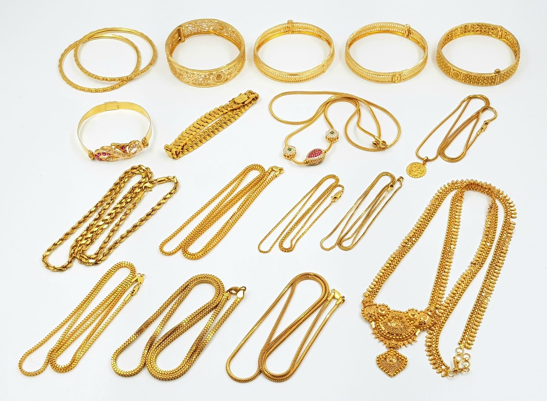 An Immense Lot of 18K and 22K Yellow Gold. 18K to include: 2 bangles - 6cm inner diameter, 2