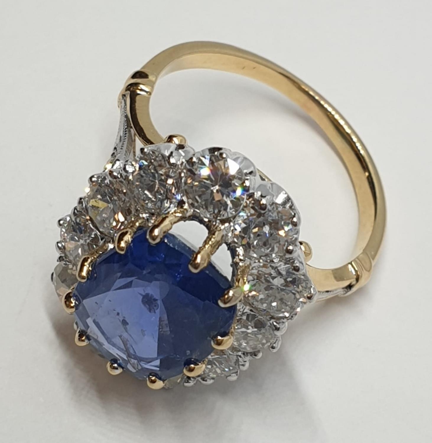 5.75ct sapphire ring set in white and yellow gold with over 3.5ct diamonds surrounding, weight 6. - Image 4 of 12