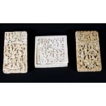Antique Chinese 19th century carved ivory box with puzzle and two card cases, the square slim box