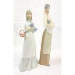 Two porcelain figures in the style of Lladro, made in Spain. Height: 17 cm and 14 cm respectively.