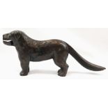 AN UNUSUAL PATENTED METAL EDWARDIAN DOG SHAPED NUT CRACKER . 30cms wide and 12cms tall