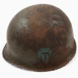 WW2 US M1Fixed Bale Helmet with front seam, badged to the 36th Infantry Division. Missing 1 bale.