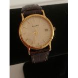 Gentlemans ACCURIST Quartz Wristwatch In gold tone with sweeping second hand and date window.Full