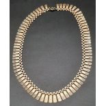 A 9K Yellow Gold Flat Link Choker Necklace. Small fan-like 15mm links. 38cm length. 18.63g