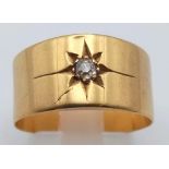 An 18k Yellow Gold Diamond Solitaire Band Ring. Size O. 4.78g