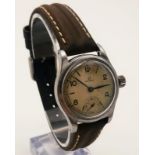 A Vintage Omega Military Style Watch. Brown leather strap and steel case - 31mm. Second sub dial.