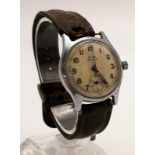 A WW2 German Kriegsmarine (KM) Selza Wristwatch. Original leather strap. Steel case - 30mm.
