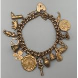 A Vintage 9K Yellow Gold Eclectic Charm Bracelet. Fifteen charms. 16cm. 37.22g.