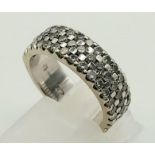 An 18K White Gold Diamond Cluster Band Ring. Three rows of diamonds - 51 in total! Size L1/2. 6.5g