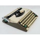 A Vintage Olympia Deluxe Typewriter in Original Case. Good condition but probably needs a service!