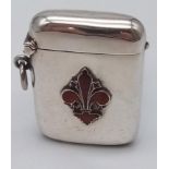 An Antique Silver and Red Enamel Fleur de Lis Emblem Decorated Vesta Case.. Hallmarks for Birmingham