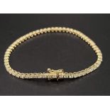 An 18K White Gold Diamond Tennis Bracelet. 2.7-3ct. IJ-SI Grade. 9g. 18cm.