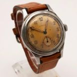 A Vintage Longine Gents Watch. Leather strap and stainless steel case - 35mm. Mechanical hand-wind