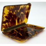 An Antique Tortoiseshell Cigarette Case. Clasp works. Good condition for age. 12 x 8cm