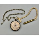 A LATE 19TH CENTURY SILVER POCKET WATCH ORNATE FACE ,GOLD EDGING , ROMAN NUMERALS AND HAND