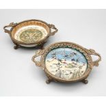 A pair of Victorian style Wong Lee brass and ceramic plates. Brass mounts with a scrolling,