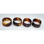 Four Vintage Tortoiseshell Napkin Rings. Slight chip damage so A/F.