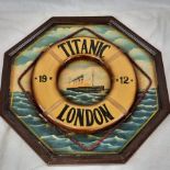 A Vintage Titanic Artwork with Wooden Decorated Life Preserver Attached. In frame - 62 x 62cm.