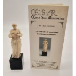 An English carved ivory figure of a Christian lady on a stone pedestal, with Certificate of
