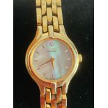 Ladies CITIZEN ECO - DRIVE wristwatch having mother-of-pearl face with gold tone articulated