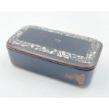 An Antique Papier Mache Snuff Box with Mother of Pearl Inlay. 2 x7cm.
