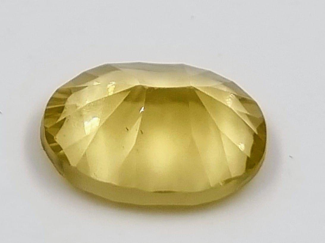 9.22ct Oval Concave Cut Lemon Quartz GLI Certified. - Image 4 of 4