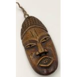 An African 19th Century Congo (Lega tribe) Ivory Passport Mask. Used as a means of identification