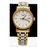 A Longine Two-Tone Ladies Watch. Case - 25mm. White dial. Date window. Quartz movement. In working