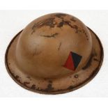 WW2 British Royal Artillery MK II Helmet in North Africa Desert Campaign Colour. Stamped by the