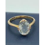 9 carat GOLD RING with AQUA quartz solitaire mounted to top. 2.3 grams. Size M 1/2.