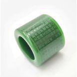A magnificent, Chinese, green jade thumb ring (ARCHER?S RING) with over 250 Chinese calligraphy