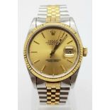 A gents ROLEX Oyster Perpetual Datejust stainless steel and 18 K yellow gold watch. 36 mm dial, with