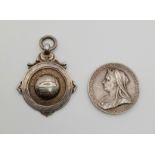 An 1897 Queen Victoria Diamond Jubilee Silver Medal and a Silver YMCA 1950 Football medal.