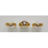 A trilogy of 22K yellow gold diamond rings. Size: N, total weight: 10.6 g.