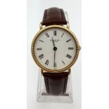 A Raymond Weil Quartz Gents Watch. Leather strap. Two-tone case - 32mm. White dial. In working