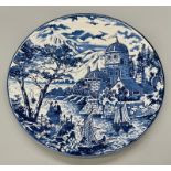A LARGE BLUE AND WHITE DISPLAY OR SERVING PLATE. 31cms DIAMETER