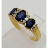 An 18 K yellow gold ring with blue sapphires and diamonds. Ring size: K, weight: 3.03 g.