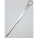 A SOLID HALLMARKED SILVER LETTER OPENER . 50.5gms 22.5cms