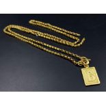 A 22 K yellow gold pendant (with letter B) and chain. Length: 65 cm, total weight: 19 g. A/F