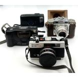 4 VINTAGE CAMERAS TO INCLUDE A NIKON ZOOM 310, A RICOH 500GX , A BRAUN SUPER PAXETTE AND ANOTHER