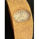 Vintage 1950/60?s ROTARY ladies bracelet wristwatch, having wide textured gold tone bracelet with
