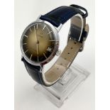 A Rare Vintage Enicar Gents Mechanical Watch. Leather strap. Stainless steel case - 35mm. Two-tone