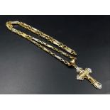 A 14 K gold Russian cross with Jesus pendant with chain. Cross dimensions: 40 x 24 mm, chain length: