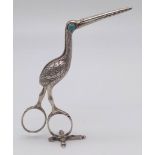 An Antique Pair of German Solid Silver Stork Baby and Embroidery Scissors. Baby inside of stork.