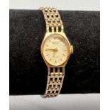 A Vintage Accurist 9K Gold Ladies Watch. Gold strap and case - 15mm. 13.34g total weight. A/F.