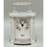A HERMLE SILVER COLOURED CARRIAGE CLOCK NEW IN BOX WITH QUARTZ MOVEMENT. 12cms x 10cms