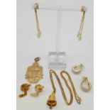 A collection of gold plated jewellery.