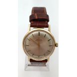 A Glorious Vintage 9K Gold Cased Zenith Gents Watch. Mechanical movement. Leather strap. Gold case -