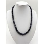 Single strand sapphire necklace with mother of pearl silver clasp